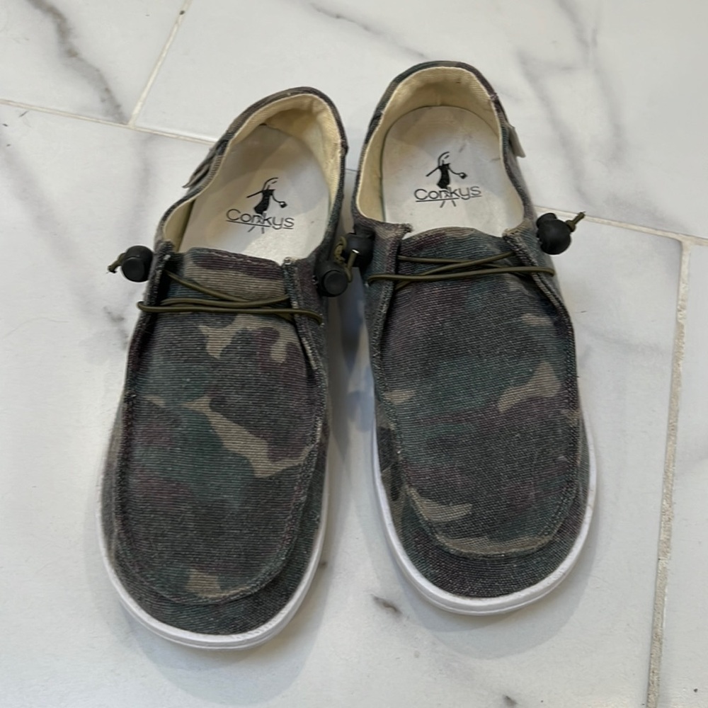 Corkys boat shoe.  Camo design. Size 8 but fit more like a 7.